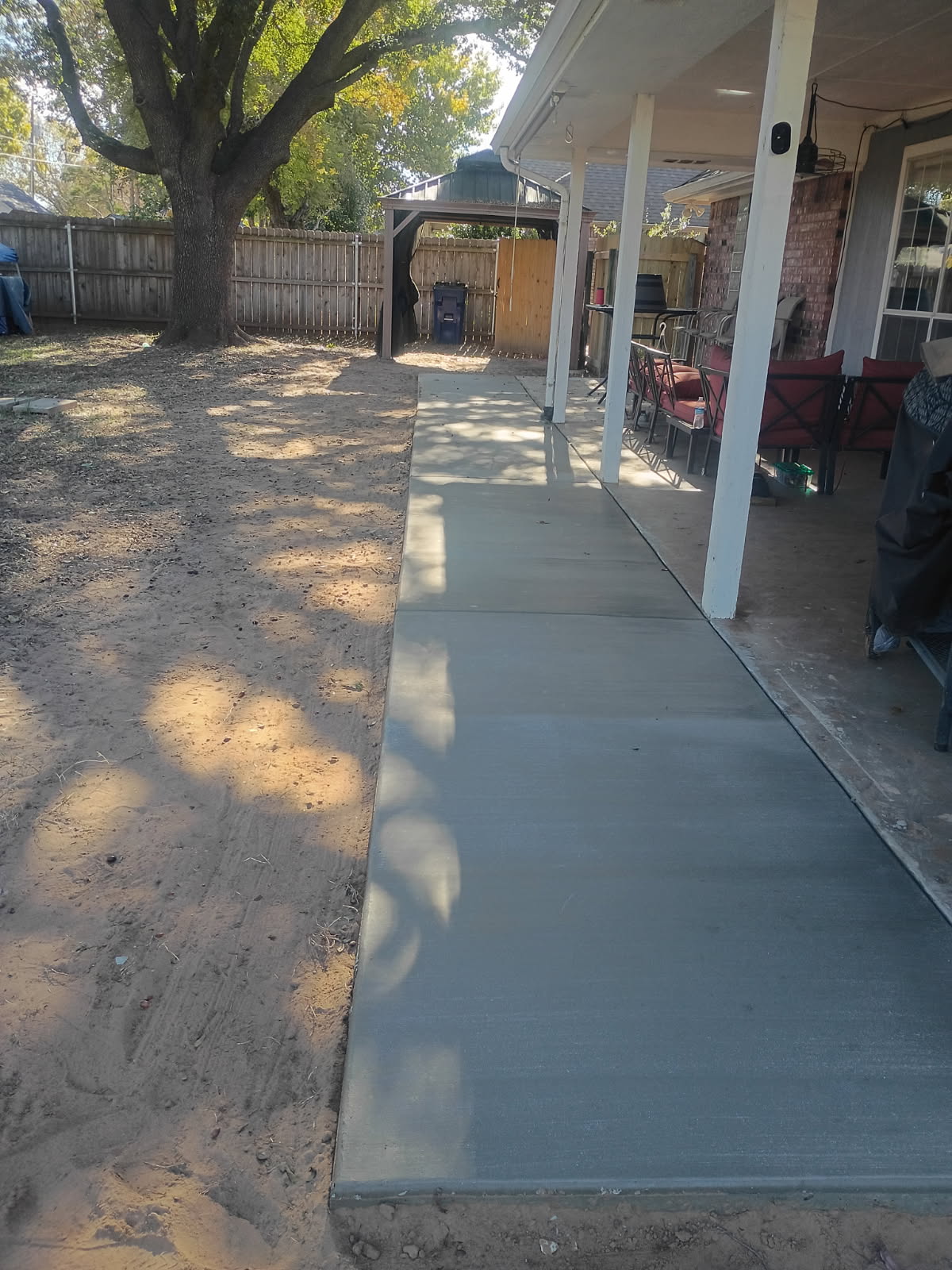 Concrete patio extension in Granbury Texas Thumbnail